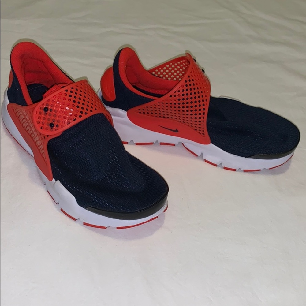 Navy and orange Nike sneakers